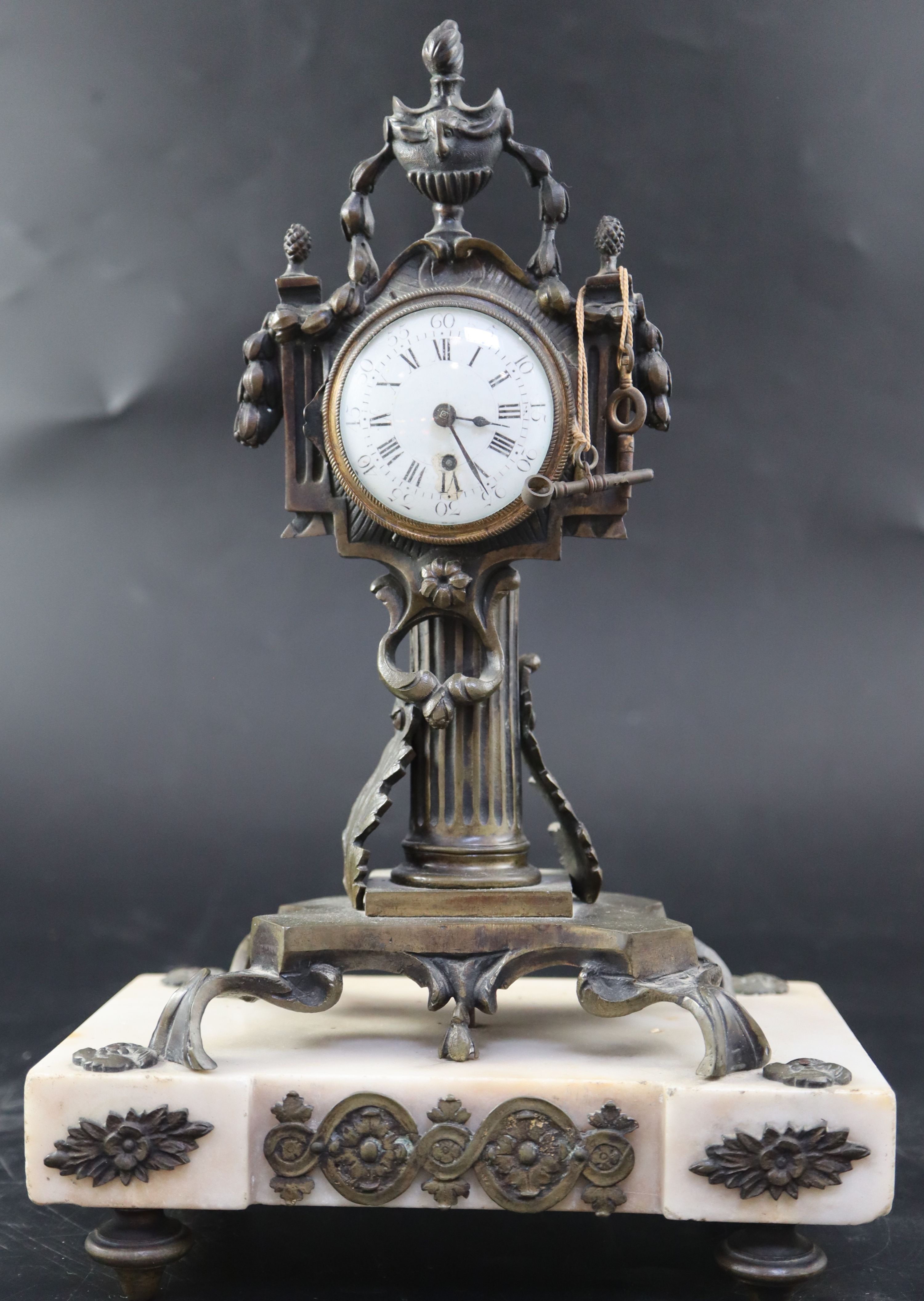 A late 18th century French marble and bronze mantel timepiece, height 30cm
